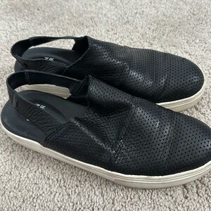 EF black leather slip ons